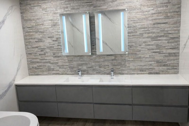 Modern bathroom renovation Essex - Contemporary bathroom with sleek fixtures and walk-in shower