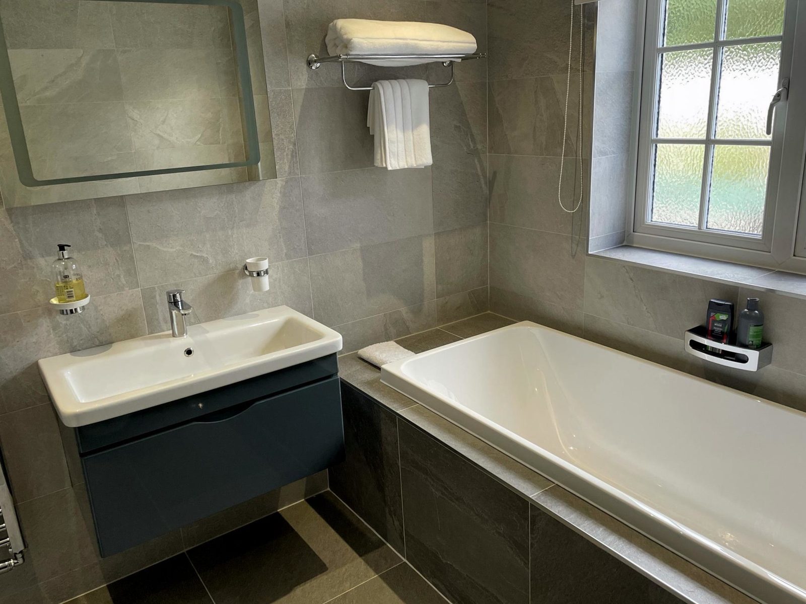 Modern bathroom fitting Essex - Complete bathroom installation with modern fixtures and tiling
