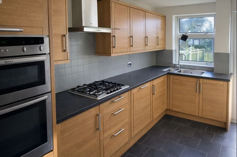 Kitchen before door, extractor and tile change